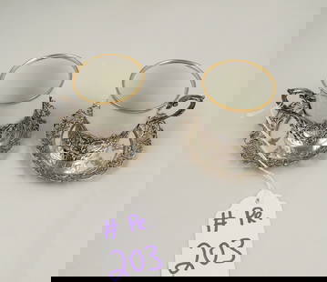 PAIR VINTAGE FRENCH STERLING SILVER DEMI TASSE CUP HOLDERS WITH TRAYS: Repousse putti. 138.5 grams. 3 1/2" dia.