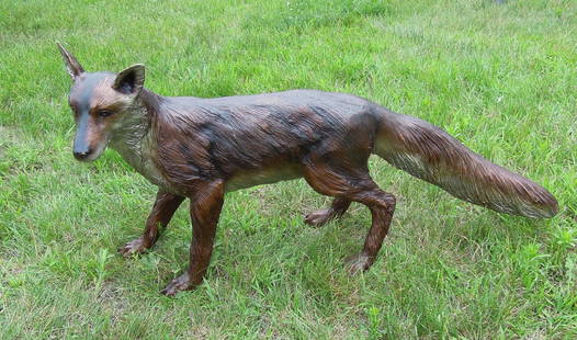 LIFE SIZE BRONZE SCULPTURE OF FOX: Standing fox. Excellent detail. 18" high, 36" long.