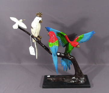 FABULOUS BRONZE SCULPTURE OF PARROTS PERCHED ON TREE BRANCH: Multi colored. Very fine detail. Five color patina. Black marble base. 23" high, 24" wide.