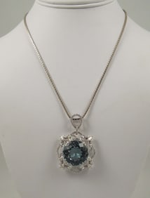 LADIES OUTSTANDING 18K W.G., BLUE TOPAZ & DIAMOND NECKLACE