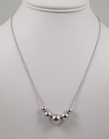 LADIES STERLING SILVER NECKLACE WITH FIVE SLIDING BEADS