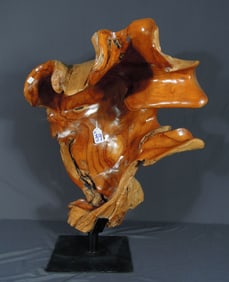 LARGE CARVED TEAK FREE FORM WOODEN SCULPTURE OF HEAVY METAL BASE