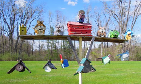 GROUP OF 13 WHIMSICAL HAND MADE WOODEN BIRD FEEDERS