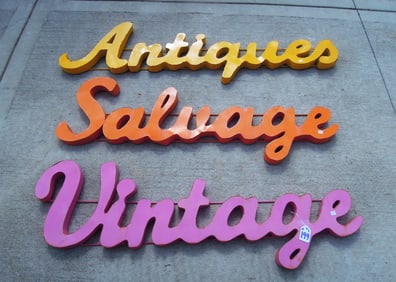 THREE VINTAGE WALL SIGNS