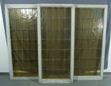 GROUP OF THREE AMBER GLASS WINDOWS