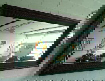 UNUSUAL LARGE HAND PAINTED METAL & BEVELED GLASS MIRROR