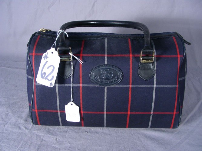 BURBERRY DESIGNER HAND BAG: A. Blue Burberry hand bag.