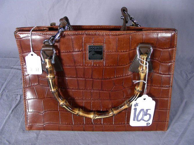 DOONEY & BOURKE DESIGNER HAND BAG: D. Brown Dooney & Bourke hand bag.