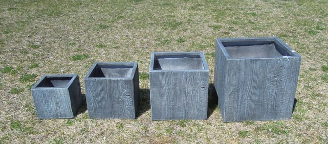 SET OF FOUR GRADUATED BARK MOTIF FLOWER PLANTERS