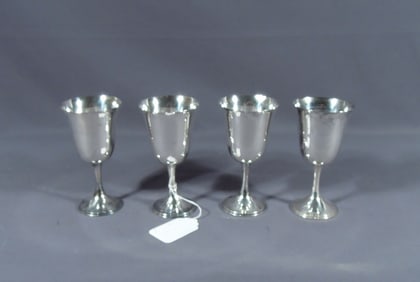 GROUP OF FOUR VINTAGE STERLING SILVER WINE GLASSES