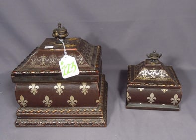 TWO GRADUATED WOOD AND LEATHER BOXES