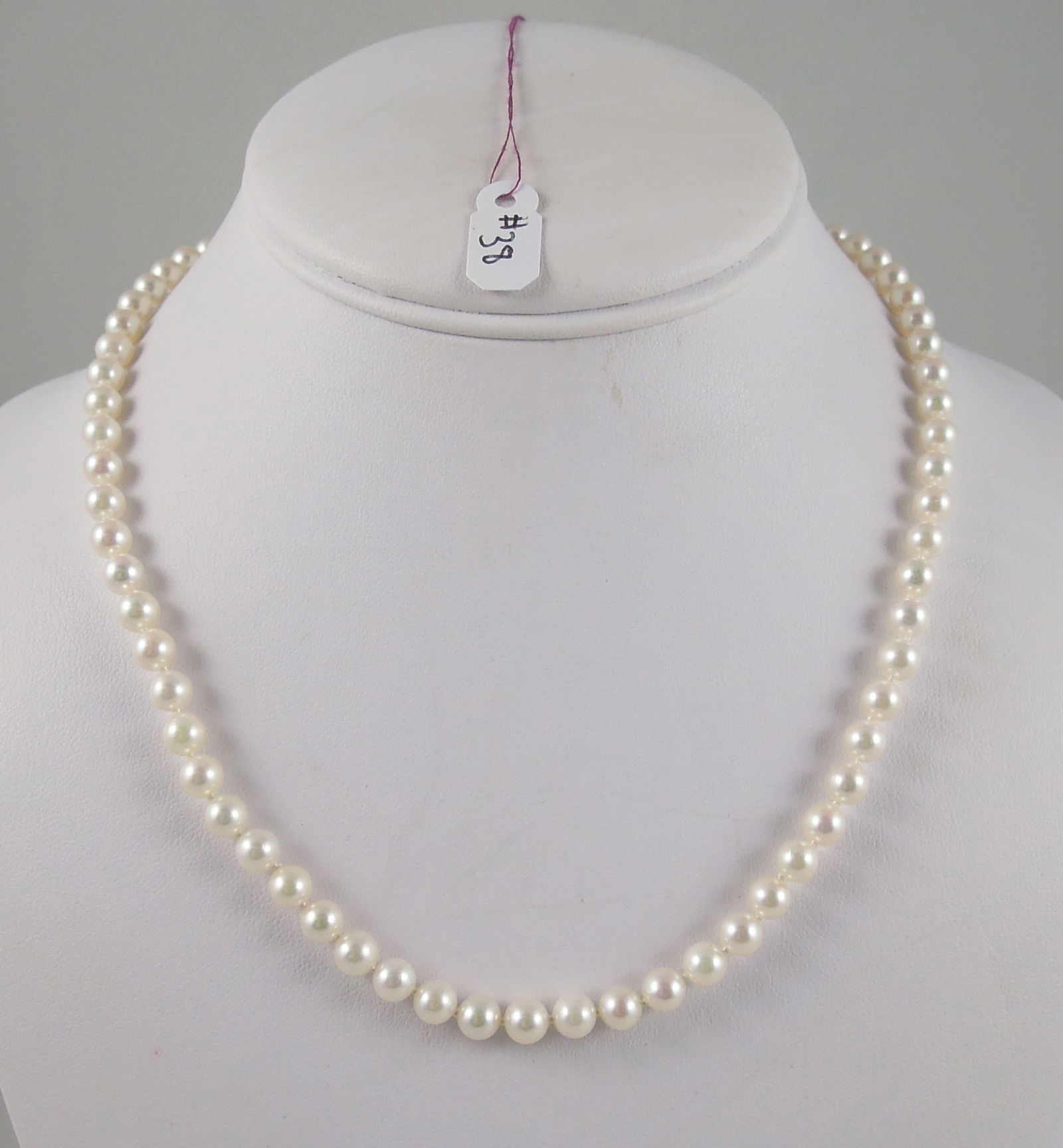 LADIES STRAND OF FINE MICKI MOTO PEARLS WITH 14K Y.G. CLASP: A beautiful 18" strand of Micki Moto pearls measuring approx. 5mm. Fabulous lustre. Signed on clasp.