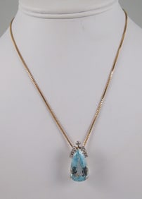 LADIES 14K Y.G. & W.G., BLUE TOPAZ & DIAMOND NECKLACE