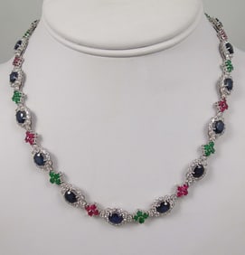 OUTSTANDING LADIES 18K W.G., SAPPHIRE, RUBY, EMERALD & DIAMOND ETERNITY NECKLACE
