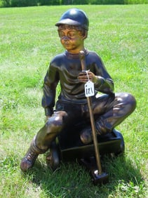 LIFE SIZE VINTAGE BRONZE SCULPTURE OF YOUNG BOY SEATED ON WAGON