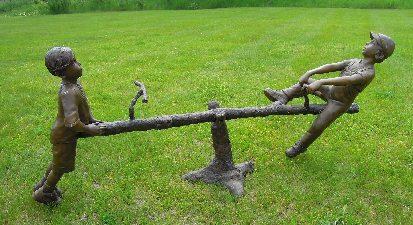 VINTAGE LIFE SIZE BRONZE SCULPTURE OF YOUNG BOYS ON TEETER TOTTER (1 of 2)