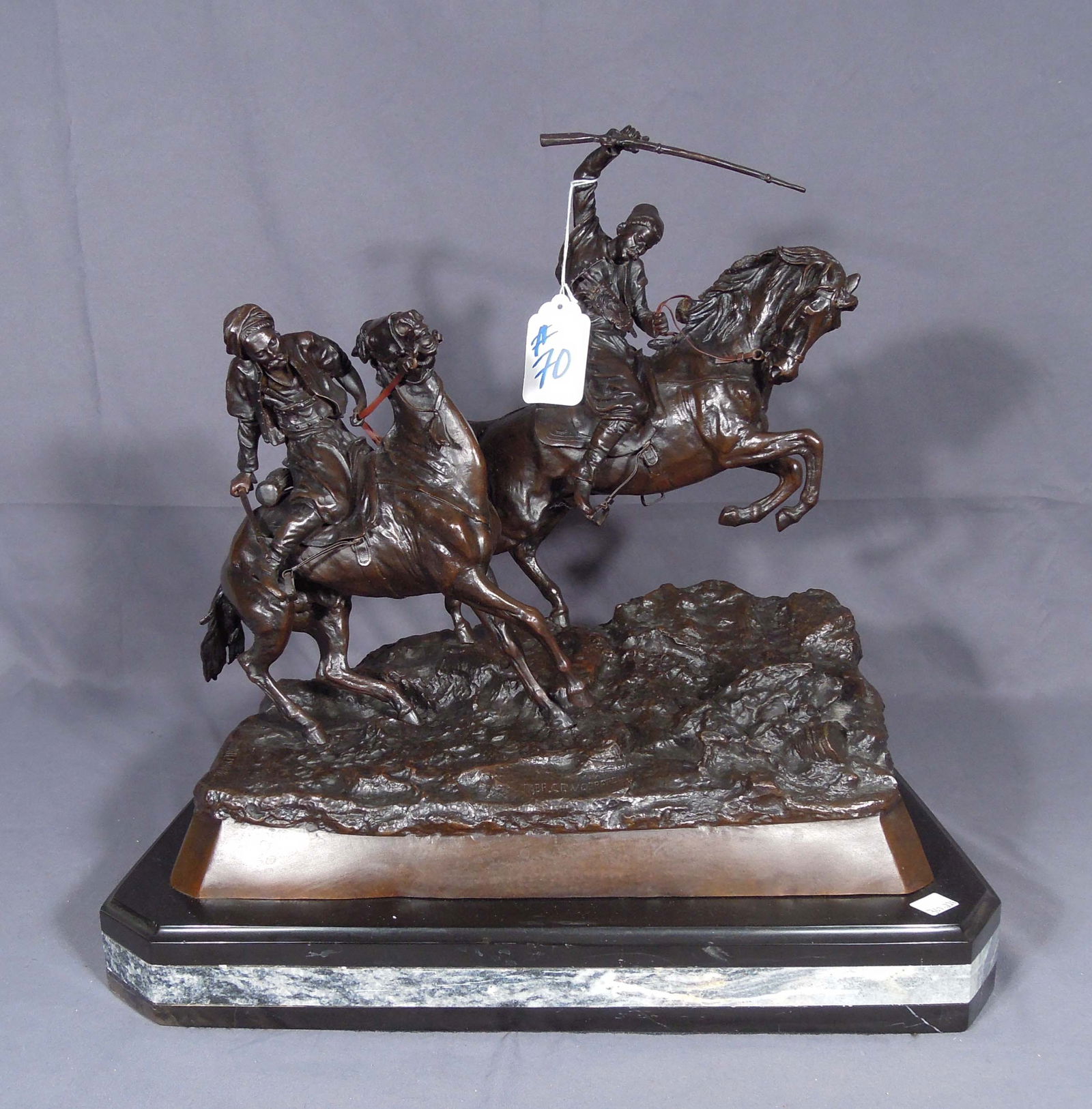 VASILY GRACHEV (1831-1905) RUSSIAN: Two Cossacks on horseback "Galloping Cherkessians". Excellent detail. Signed. Double colored marble base. 20" high, 19 1/2" wide, 13" deep.