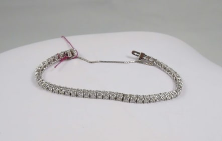 LADIES 14K W.G. & DIAMOND ETERNITY BRACELET
