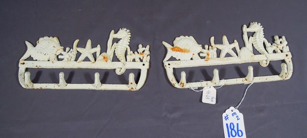 PAIR VINTAGE CAST IRON WALL HANGERS