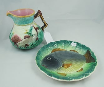 TWO ANTIQUE FISH MOTIF MOJELICA PIECES