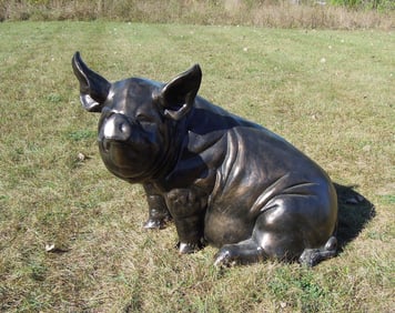 LARGE BRONZED ALUMINUM SCULPTURE OF SEATED PIG