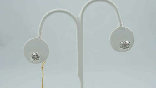 PAIR LADIES 18K W.G. AND DIAMOND STUD EARRINGS