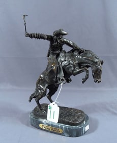 BRONZE SCULPTURE "BRONCO BUSTER" AFTER FREDERIC REMINGTON