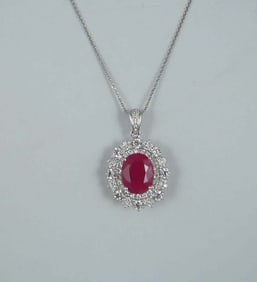 DESIGNER OSCAR FRIEDMAN LADIES PLATINUM, BERMESE RUBY AND DIAMOND NECKLACE