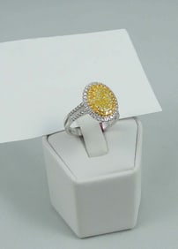 LADIES SPECTACULAR 18K W. & Y. GOLD, FANCY YELLOW DIAMOND RING