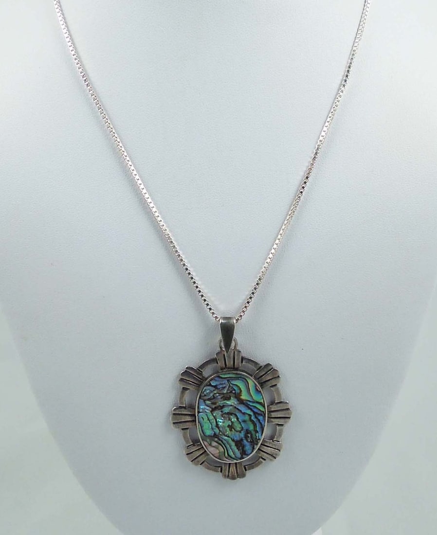 FINE VINTAGE STERLING SILVER & ABALONE NECKLACE: Chain 24" long. Pendant 2 1/2" x 1 3/4".