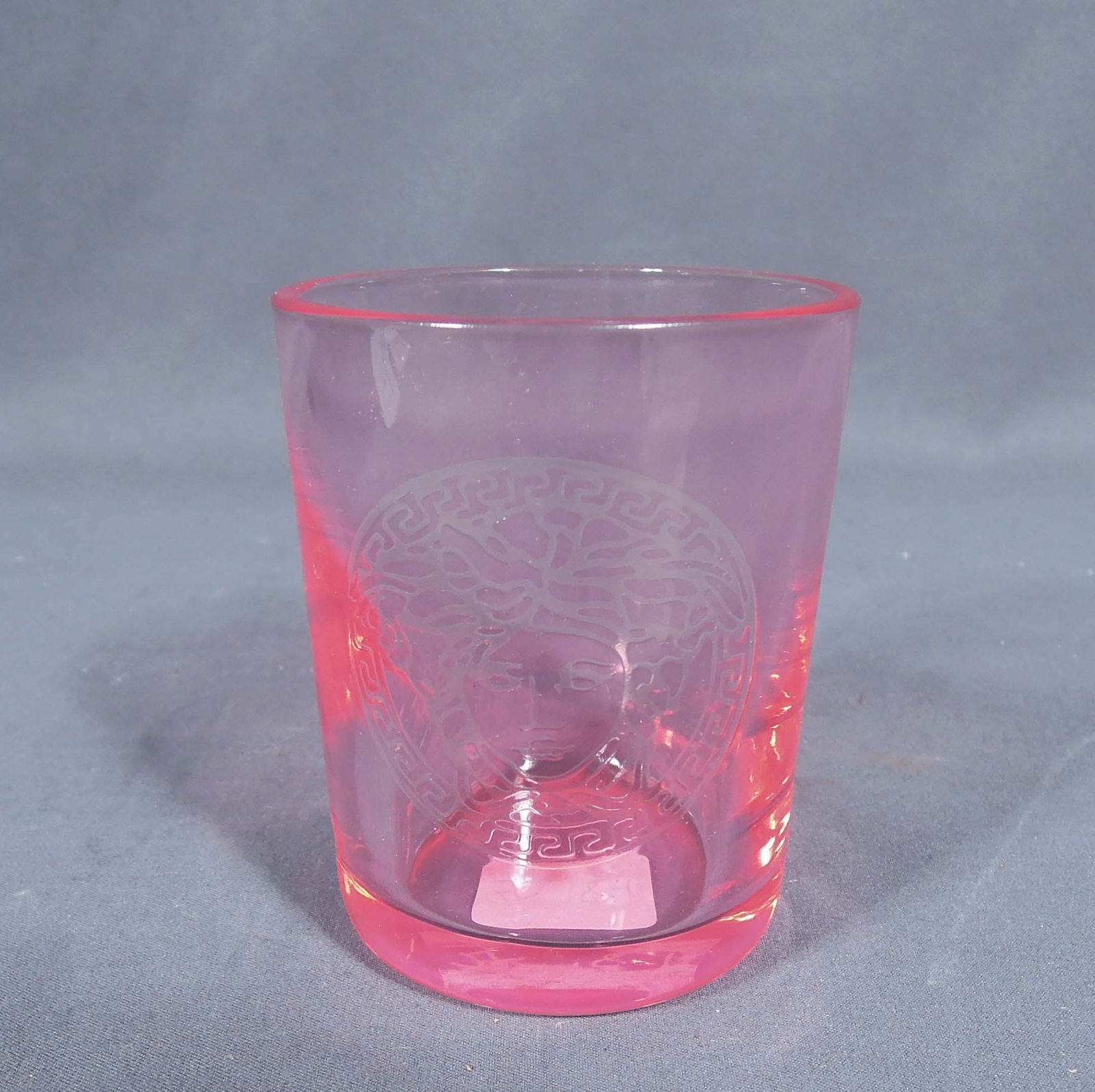 VERSACE ROSENTHAL MEDUSA VOTIF CANDLE HOLDER: Excellent condition. Blush pink coloration. Original box. 3" high, 2 1/2" dia.