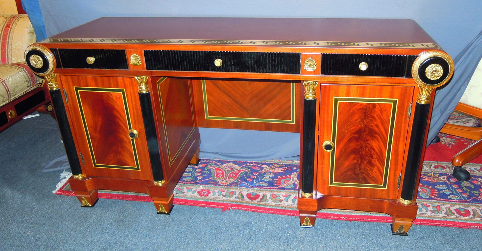 FINE ITALIAN VERSACE STYLE CONSOLE TABLE: Greek key design. Three drawers and two doors which open to reveal one shelf. Excellent condition. 30" high, 58" wide, 19 1/2" dee.