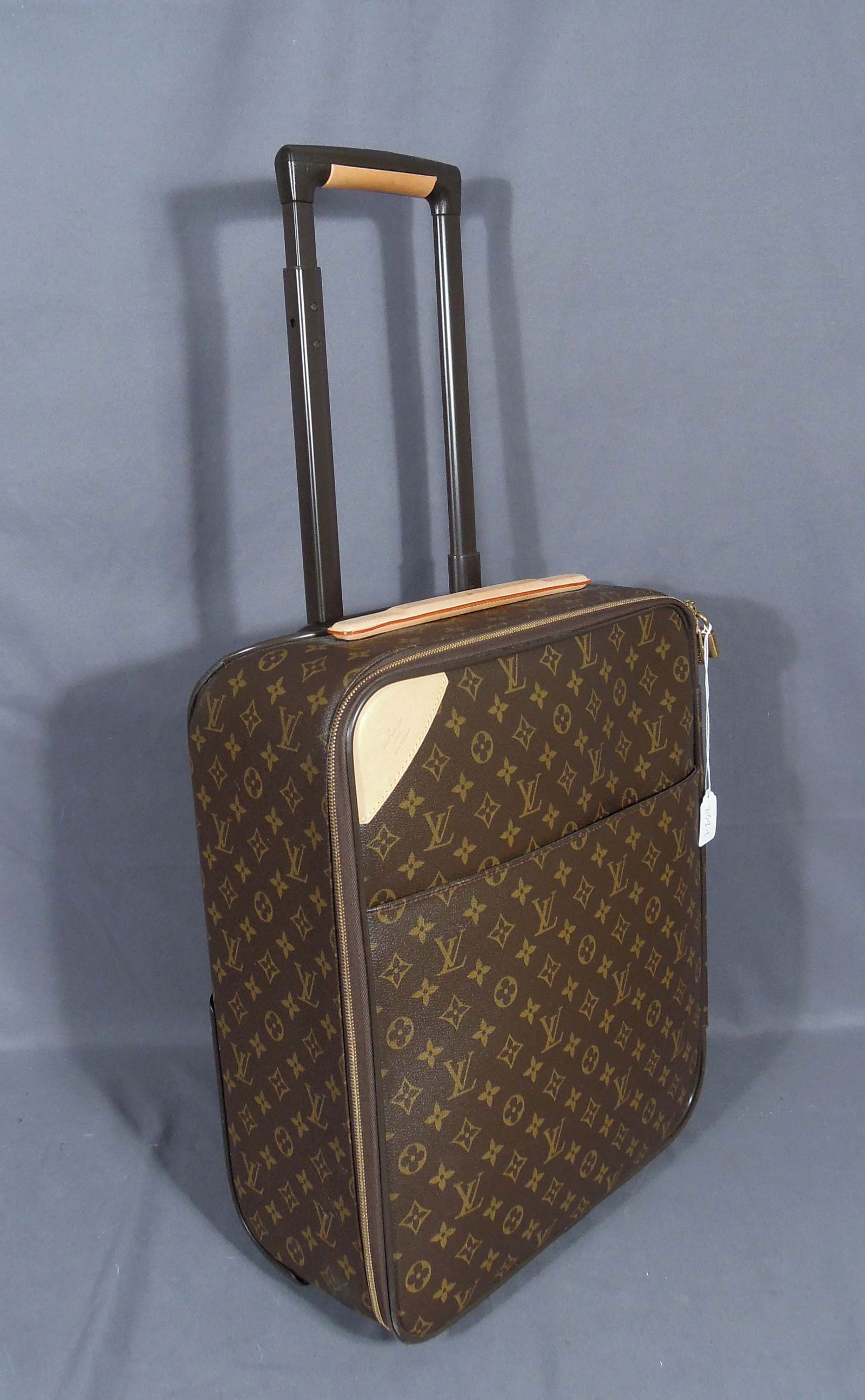 ORIGINAL LOUIS VUITTON VINTAGE ROLLING TRAVEL SUITCASE (1 of 6)