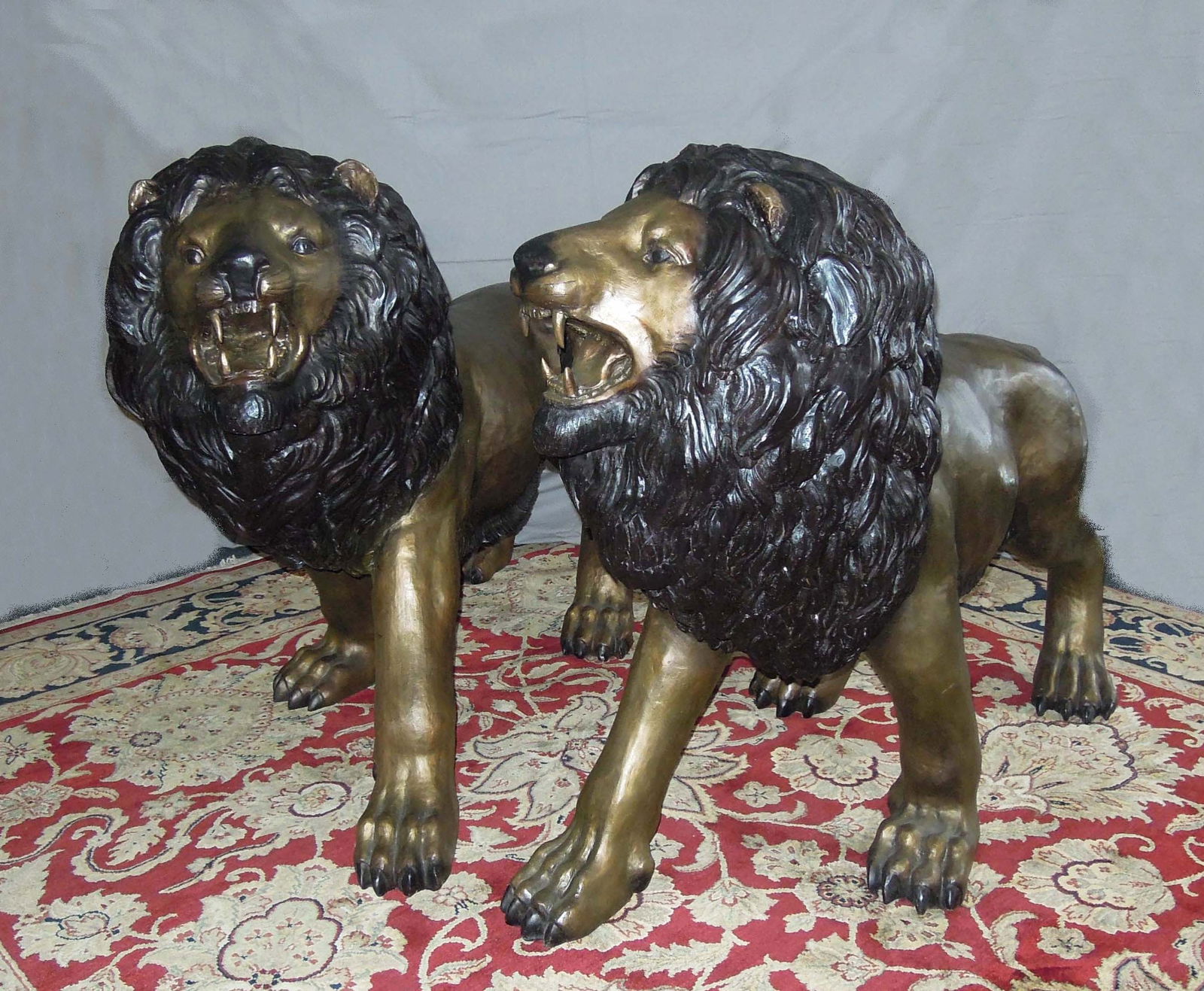 PAIR OF MONUMENTAL BRONZE SCULPTURES OF STANDING LIONS (1 of 1)
