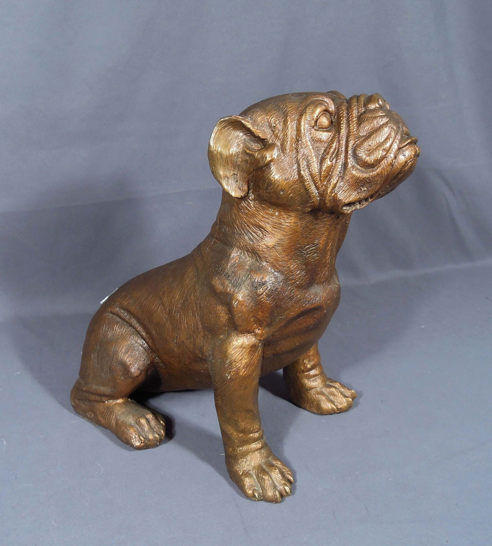 LIFE SIZE BRONZE SCULPTURE OF SEATED BULLDOG: Excellent detail. Brown patina. 16" high, 17" deep, 8 1/2" wide.