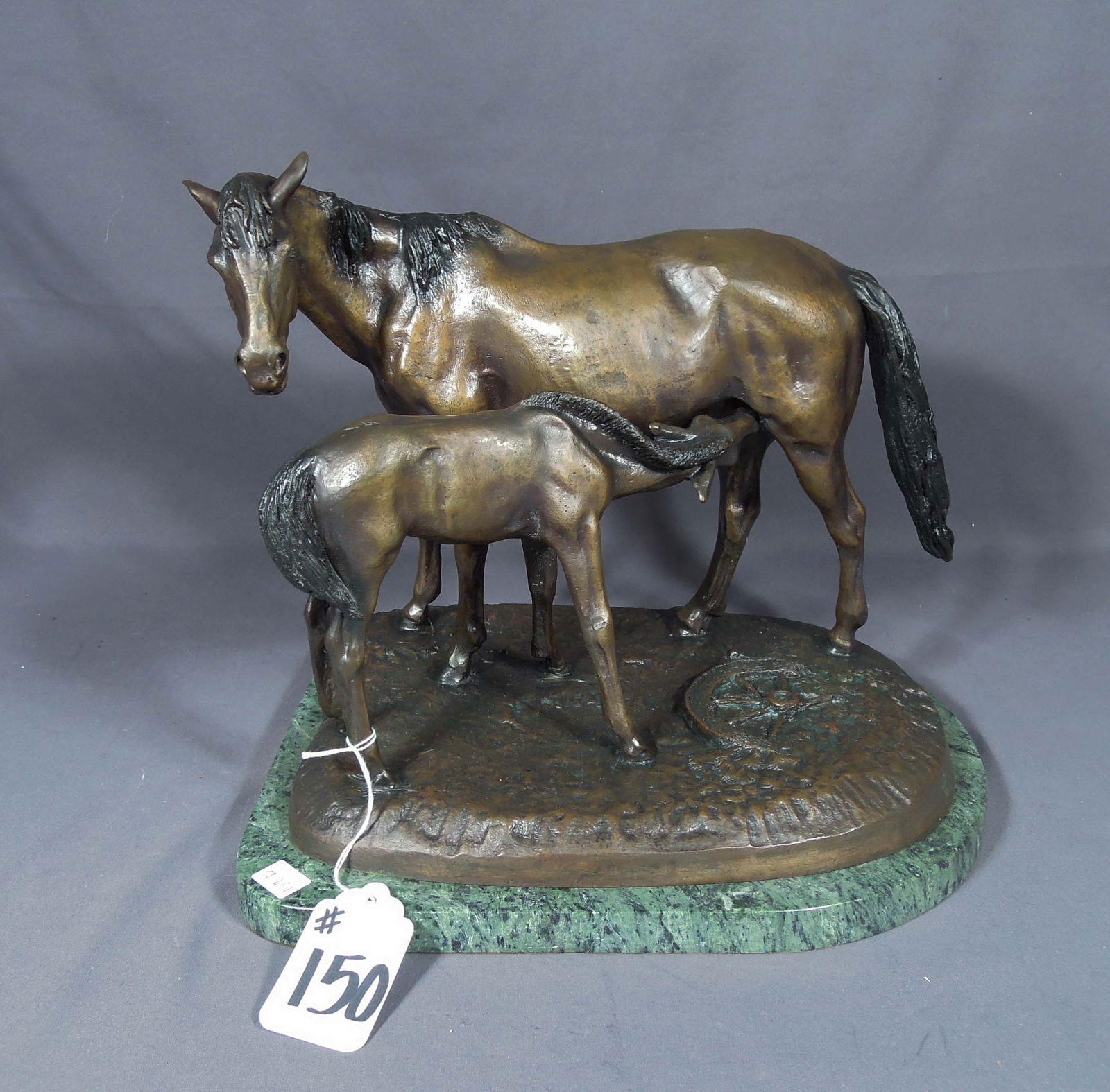 FINE BRONZE SCULPTURE "MARE & COLT" AFTER P.J. MENE: Standing mare & colt with wagonwheel on ground. Excellent detail. Brown patina. Foundry mark on base. 11" high, 14 1/2" wide, 11 1/2" deep.
