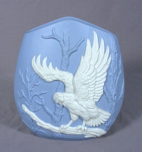 JASPERWARE EAGLE VASE: JASPERWARE EAGLE VASE Blue ground with raised white decorations. 7" high, 6 1/2" wide