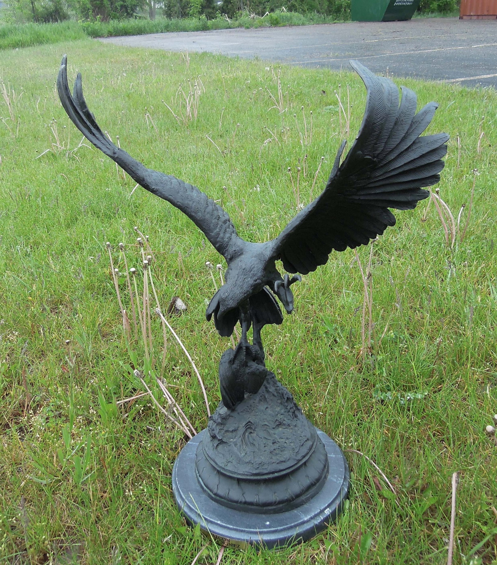 FINE BRONZE SCULPTURE OF FALCON AFTER MOIGNIEZ: Falcon with outstretched wings. Blackish brown patina. Black marble base. 25" high, 17" wide, 11" dia.