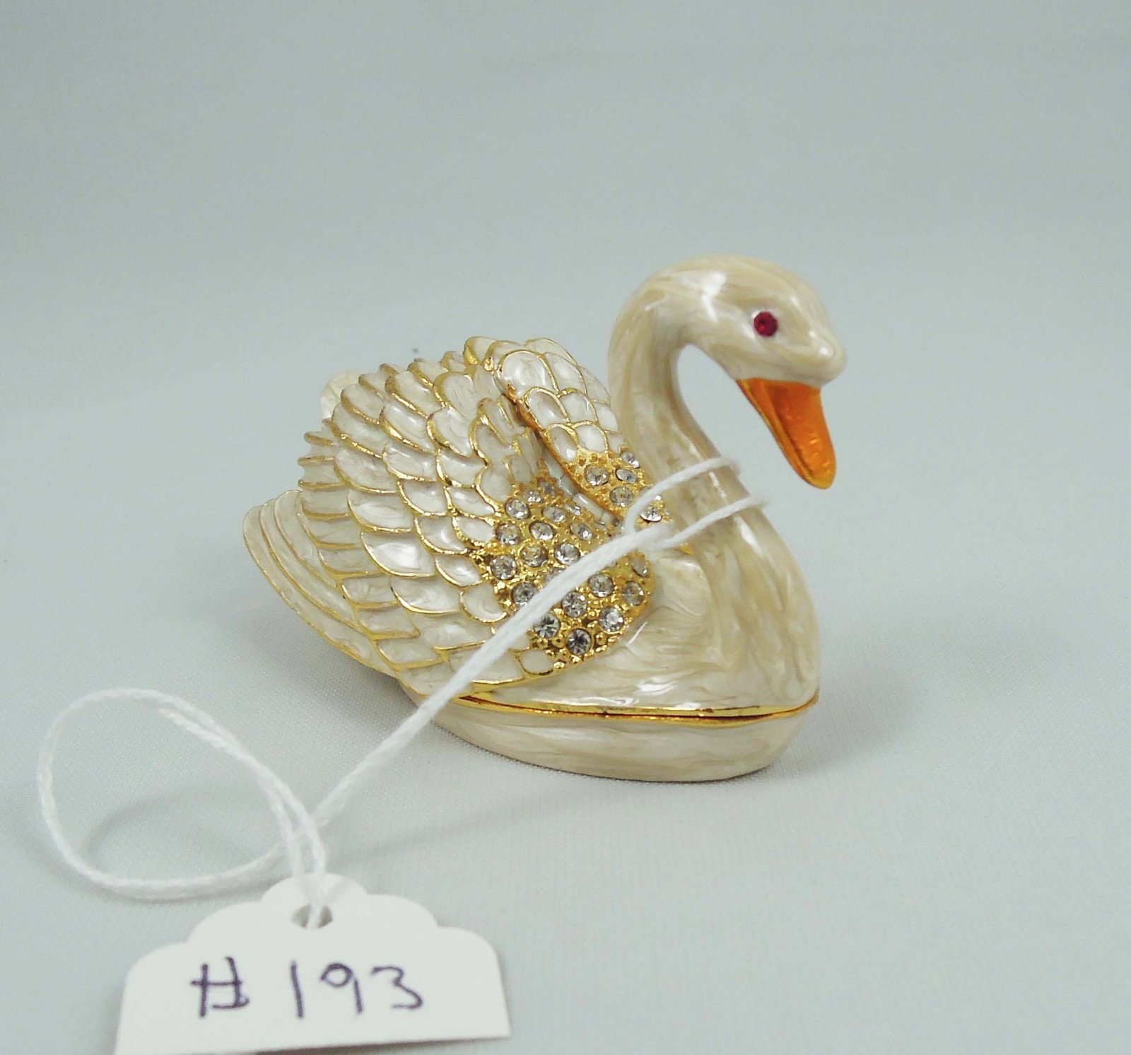 METAL, ENAMEL & RHINESTONE SWAN TRINKET BOX: 2" high, 1 1/2" wide, 3" deep.