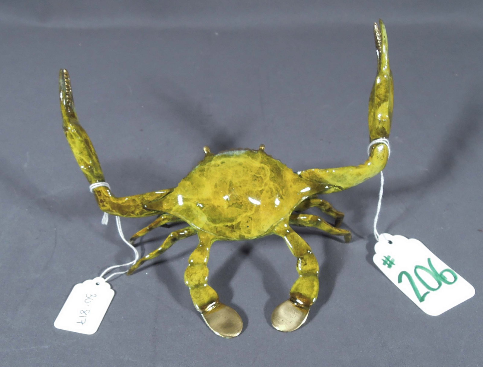 BRONZE SCULPTURE OF STANDING CRAB: Yellow coloration. 5 3/4" high, 7" wide, 5" deep.