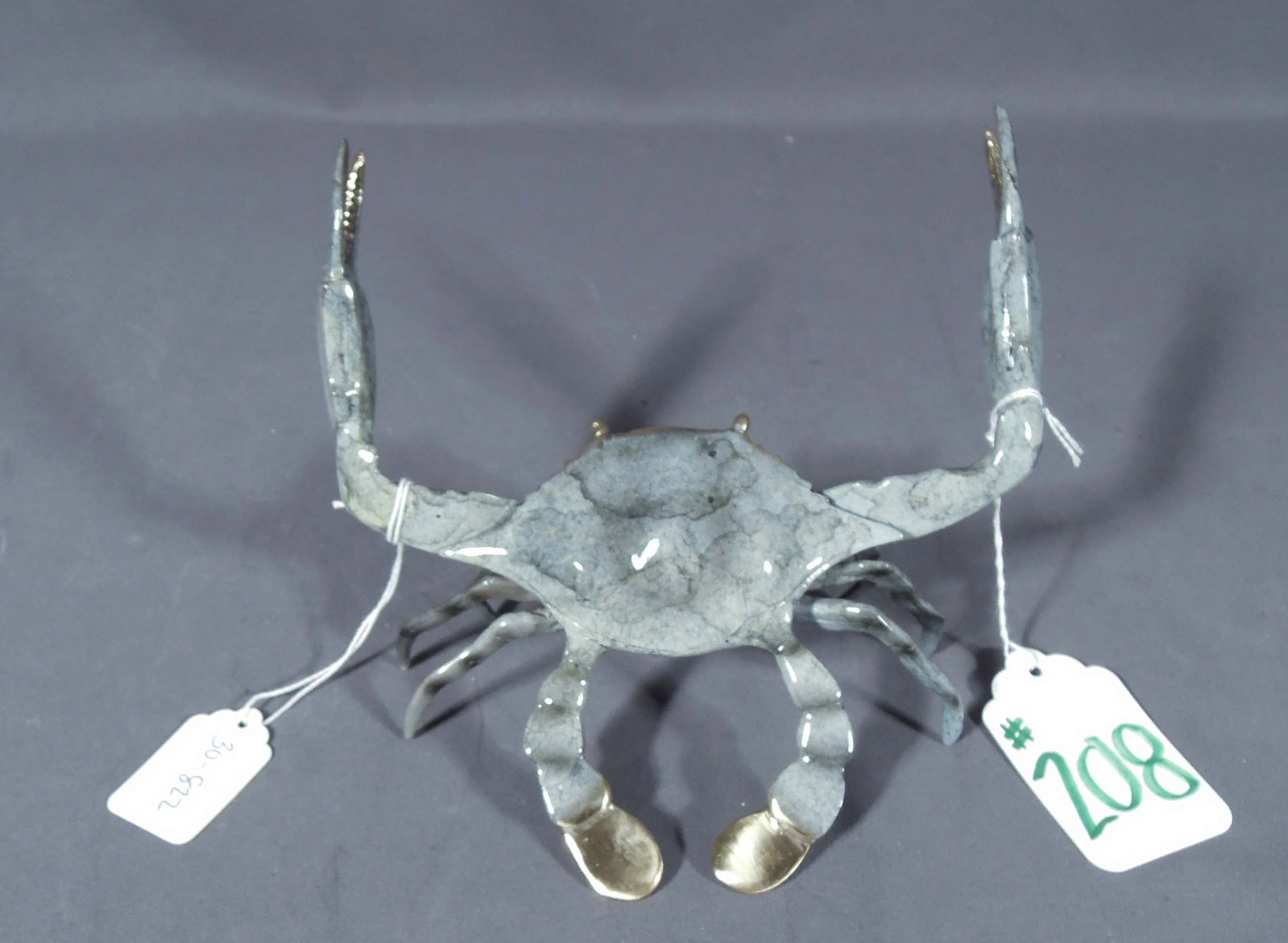 BRONZE SCULPTURE OF STANDING CRAB: Gray coloration. 5 3/4" high, 7" wide, 5" deep.