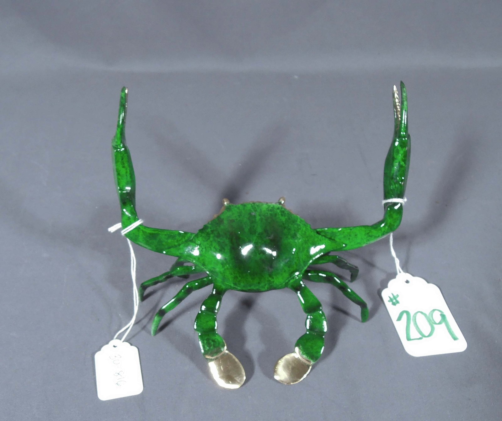 BRONZE SCULPTURE OF STANDING CRAB: Green coloration. 5 3/4" high, 7" wide, 5" deep.