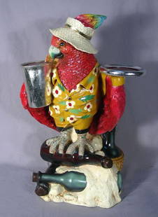 HUMOROUS COMPOSITION SCULPTURE OF STANDING PARROT: HUMOROUS COMPOSITION SCULPTURE OF STANDING PARROT Colorful standing parrot holds and ice bucket in one hand and a tray in other. 23" high