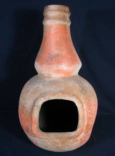 UNUSUAL MEXICAN POTTERY FIREPLACE: UNUSUAL MEXICAN POTTERY FIREPLACE Orange coloration. 34" high, 18" wide