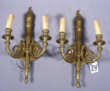 PAIR HEAVY BRONZE GILT TWO LIGHT SCONCES: PAIR HEAVY BRONZE GILT TWO LIGHT SCONCES Fine detail. Electrified. 17 1/2" high, 9 1/2" wide