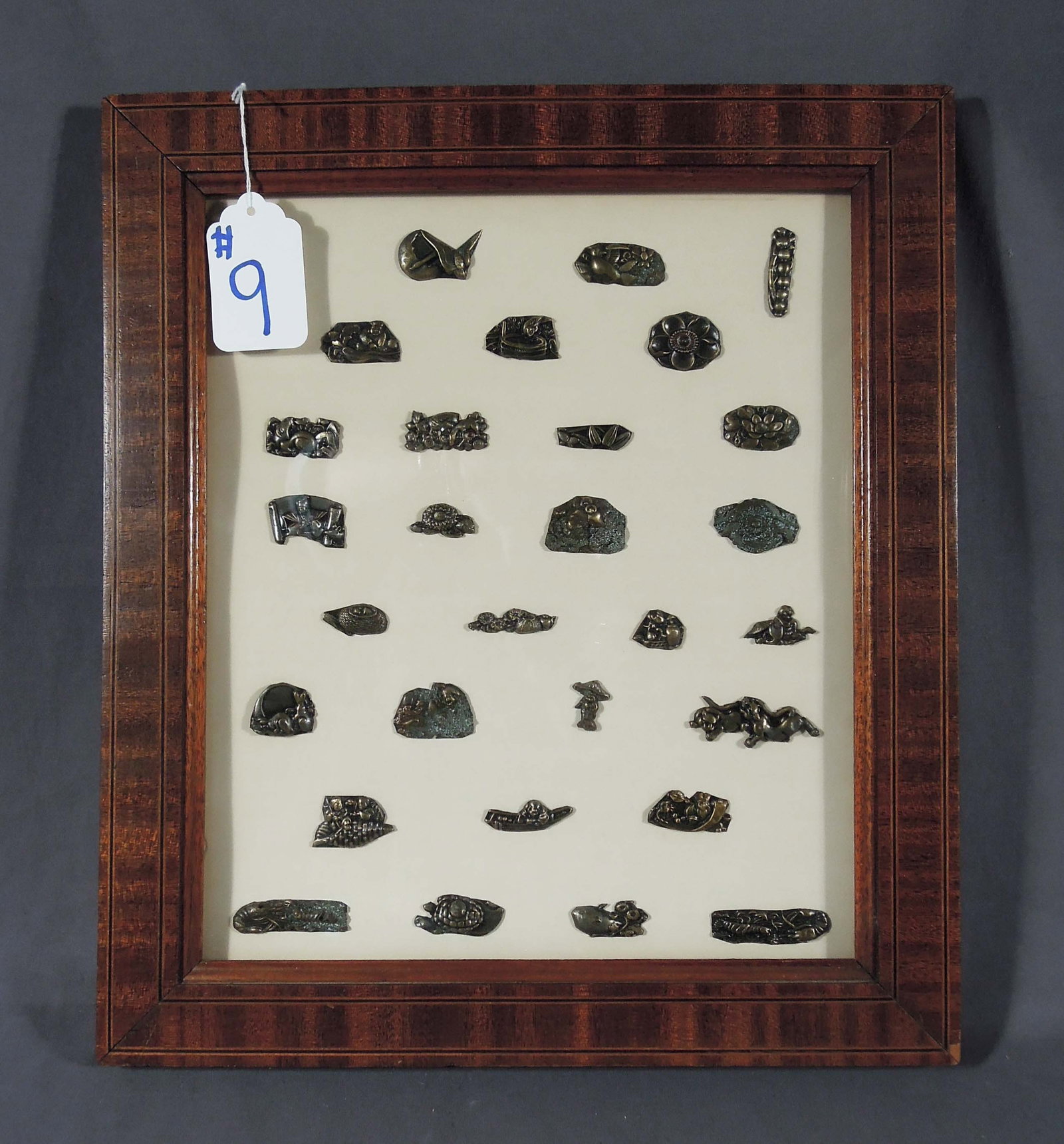 FRAMED DISPLAY OF ANTIQUE JAPANESE MENUKI (1 of 1)