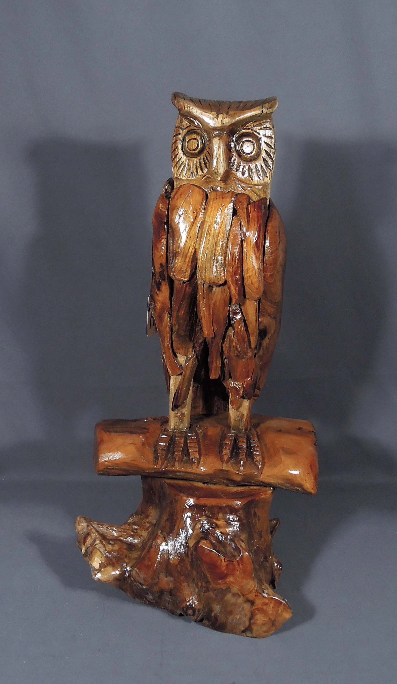 HAND CARVED TEAK SCULPTURE OF PERCHED OWL: Very heavy. Fine detail. 26" high, 13 1/2" wide, 9" deep.