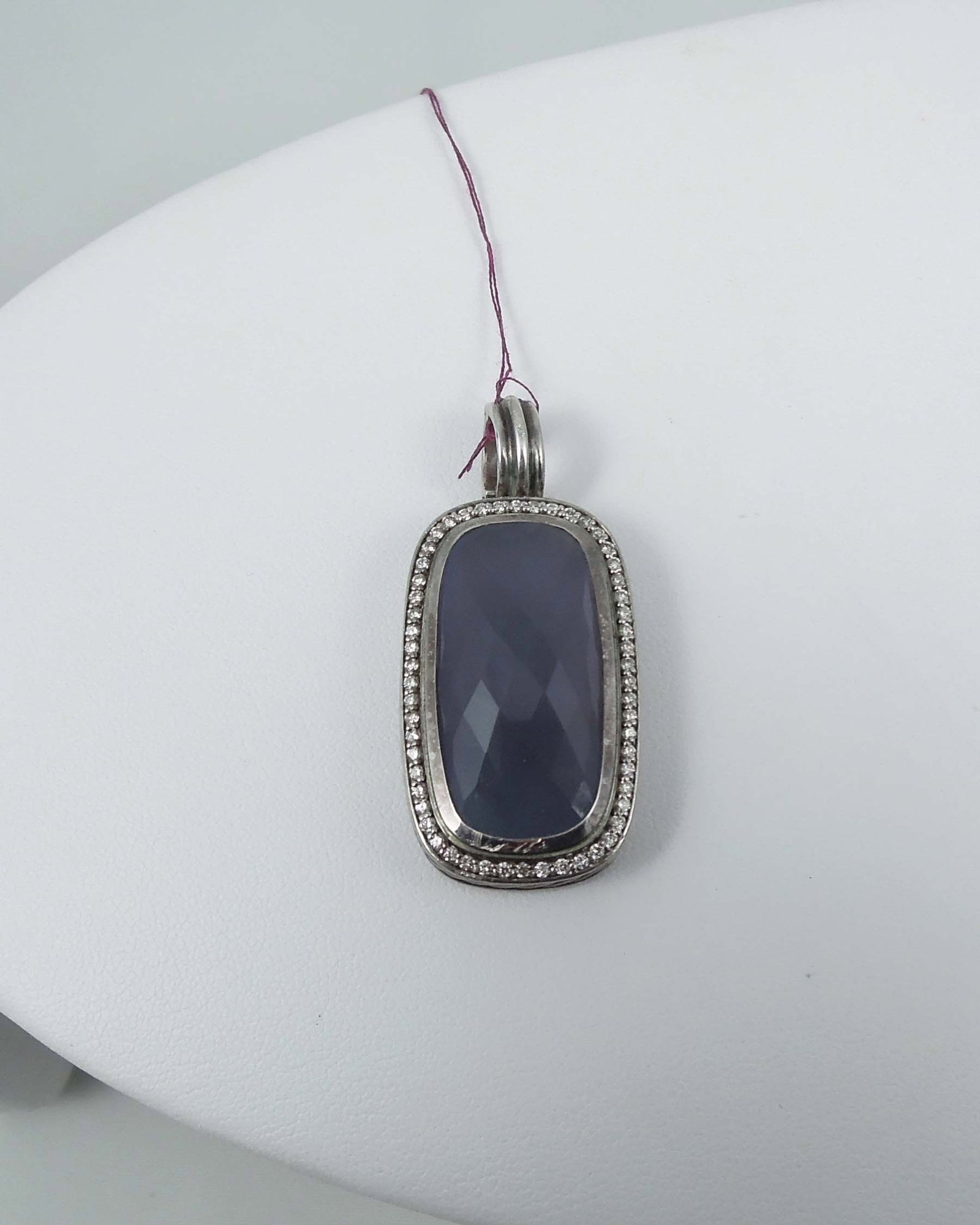 RARE VINTAGE DAVID YURMAN ALBION CHALCEDONY & DIAMOND JUMBO PENDANT: A rare sterling silver extra large Albion pendant set with a highly faceted blue chalcedony measuring 30 x 14mm. Stone surrounded by a single row of full cut round diamonds totaling approx. .44 ct. Si