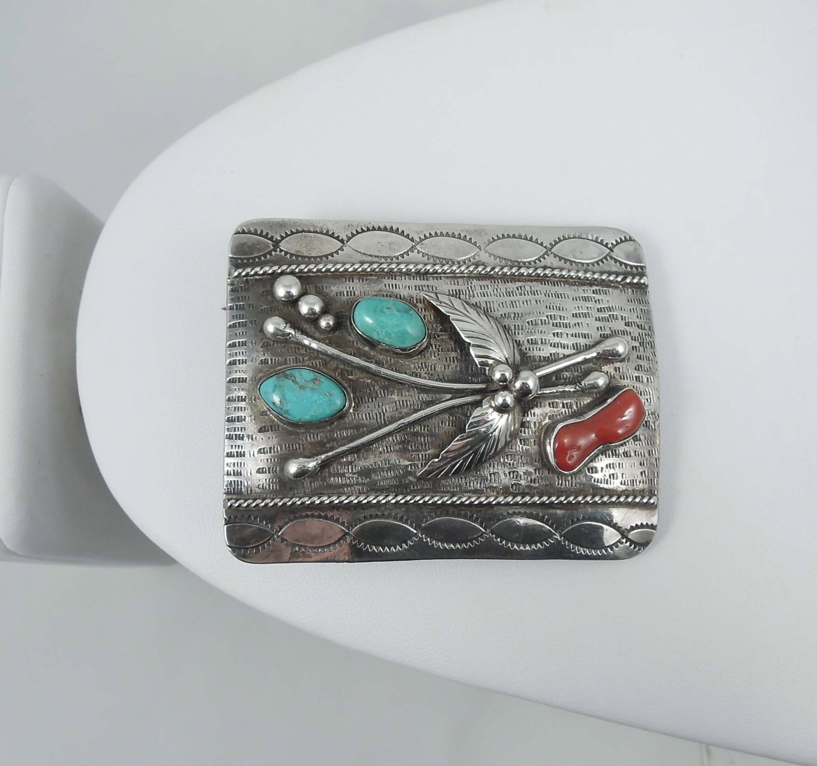 VINTAGE NATIVE AMERICAN NAVAJO STERLING SILVER, TURQUOISE & CORAL BELT BUCKLE: Very good condition. Signed by maker. Stamped RRL. Etched Navajo, hand made. 2 1/2" x 3".