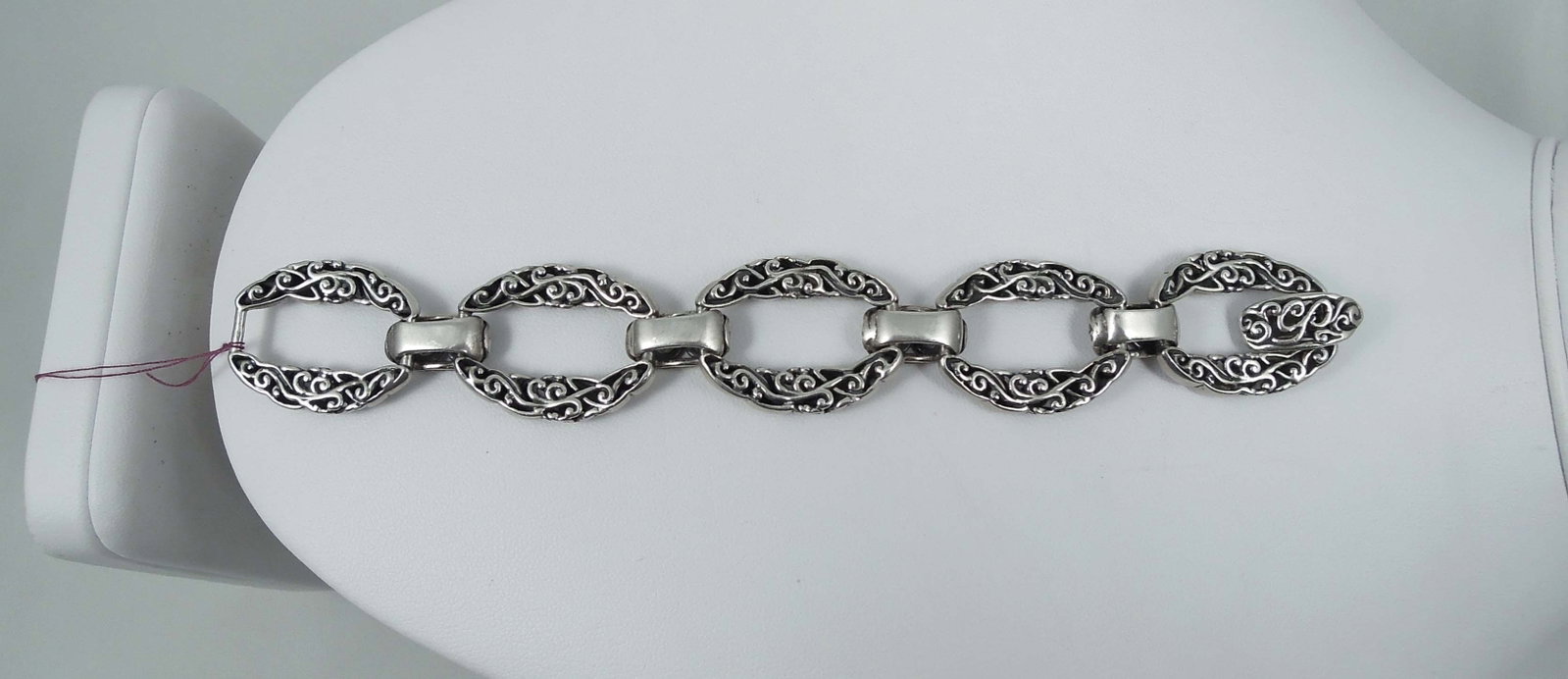 DESIGNER CAROLYN POLLACK STERLING SILVER FOLD OVER FIVE LINK BRACELET: Signed 925 with initials CP. 44.4 grams. 7" long.